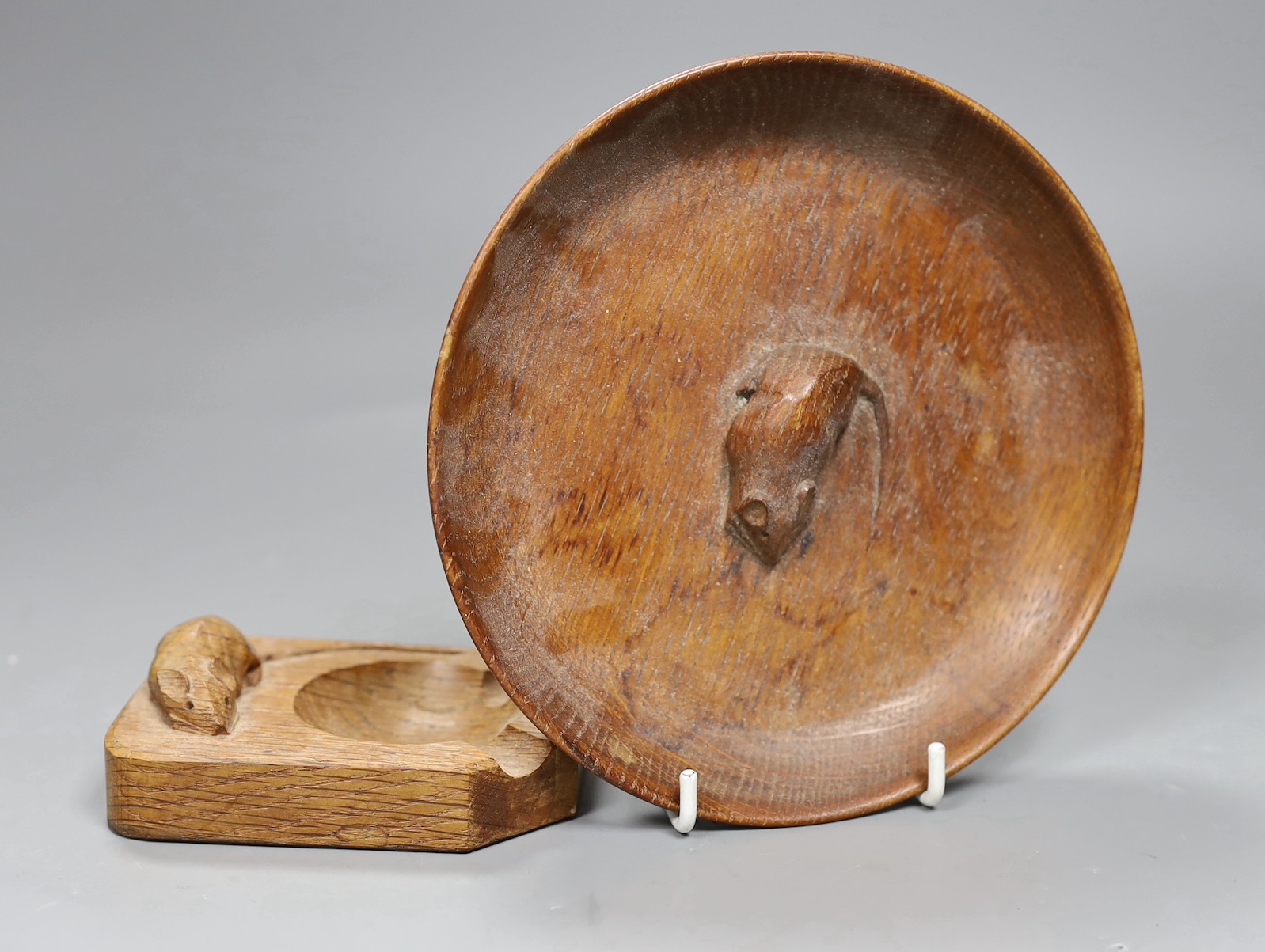 A Mouseman oak pin dish and a similar ashtray, dish 17cms diameter